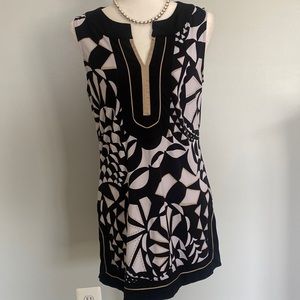 WHBM gorgeous sleeveless tunic in classic black &white w/tan details. Size M